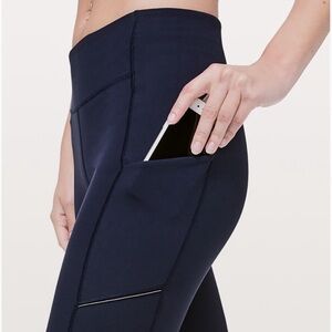 Lululemon navy leggings, woman size 2, no piling, side and back pockets